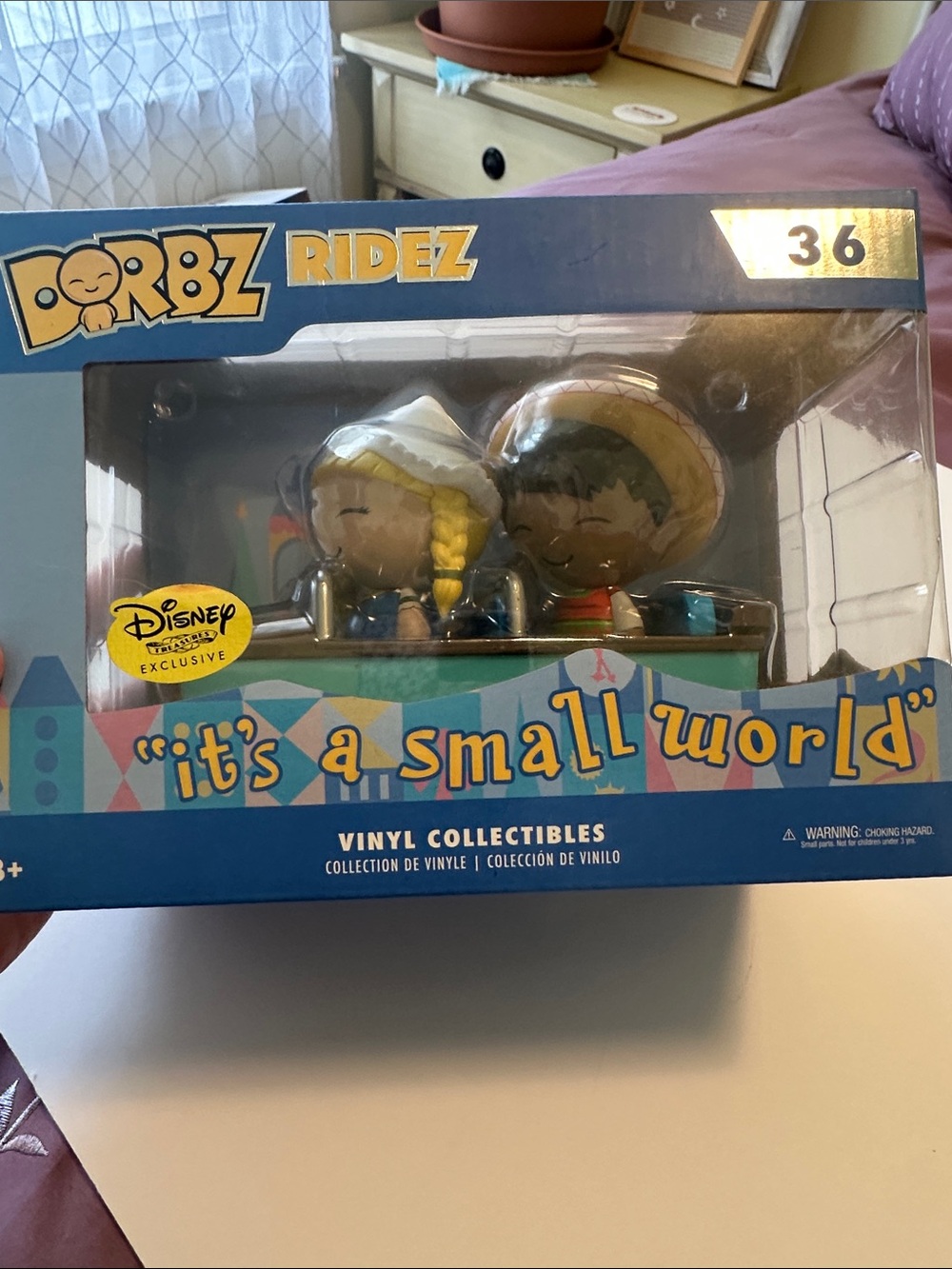 Disney Dorbz Ridez "it's a small world" Vinyl Collectible - Blue and Yellow